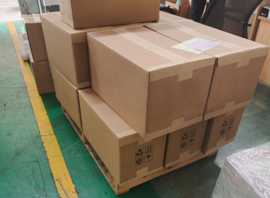 Cardboard boxes sealed with water activated tape showing professional appearance and secure seal