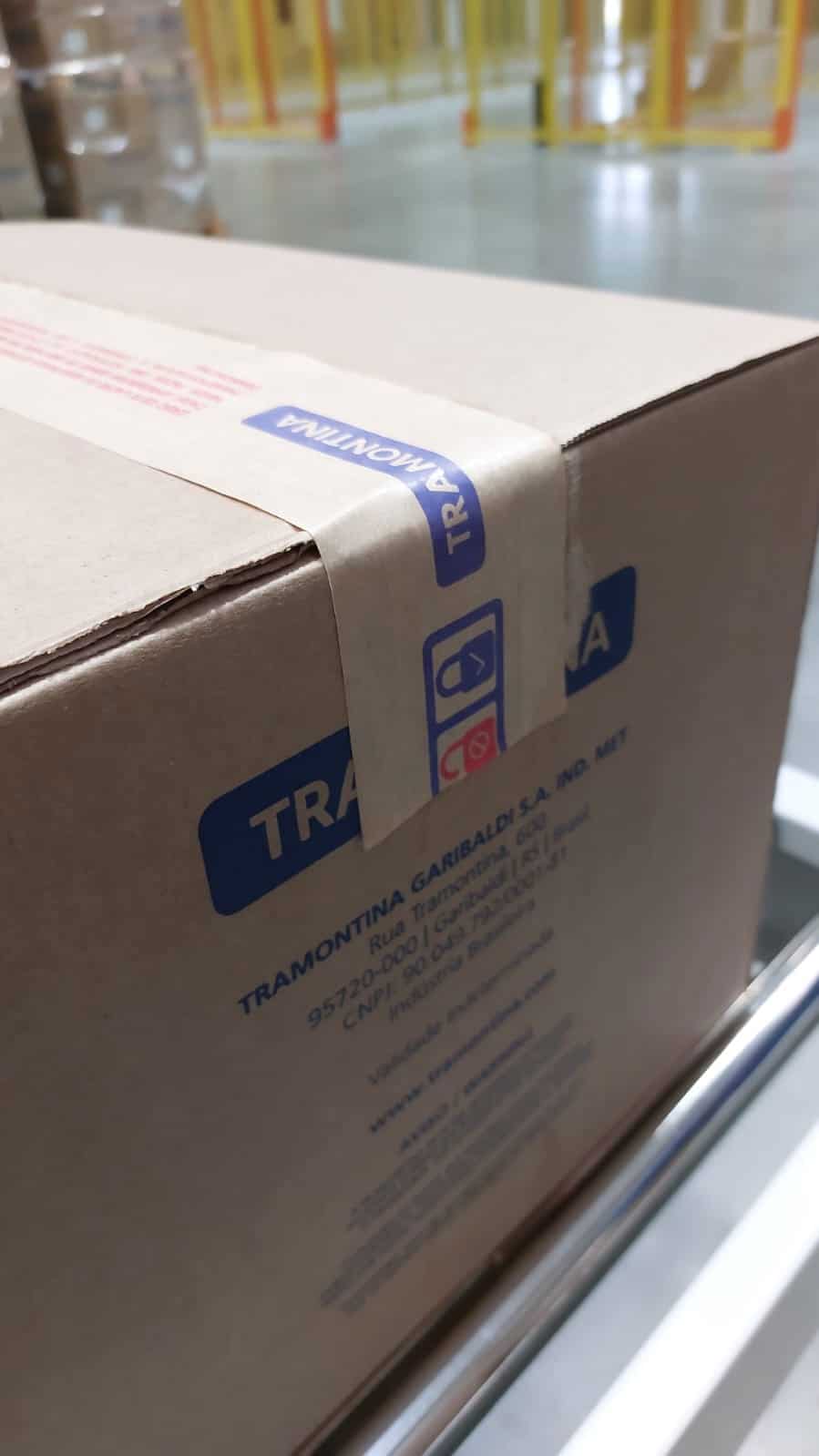 Custom printed water activated tape used on cartons in a warehouse